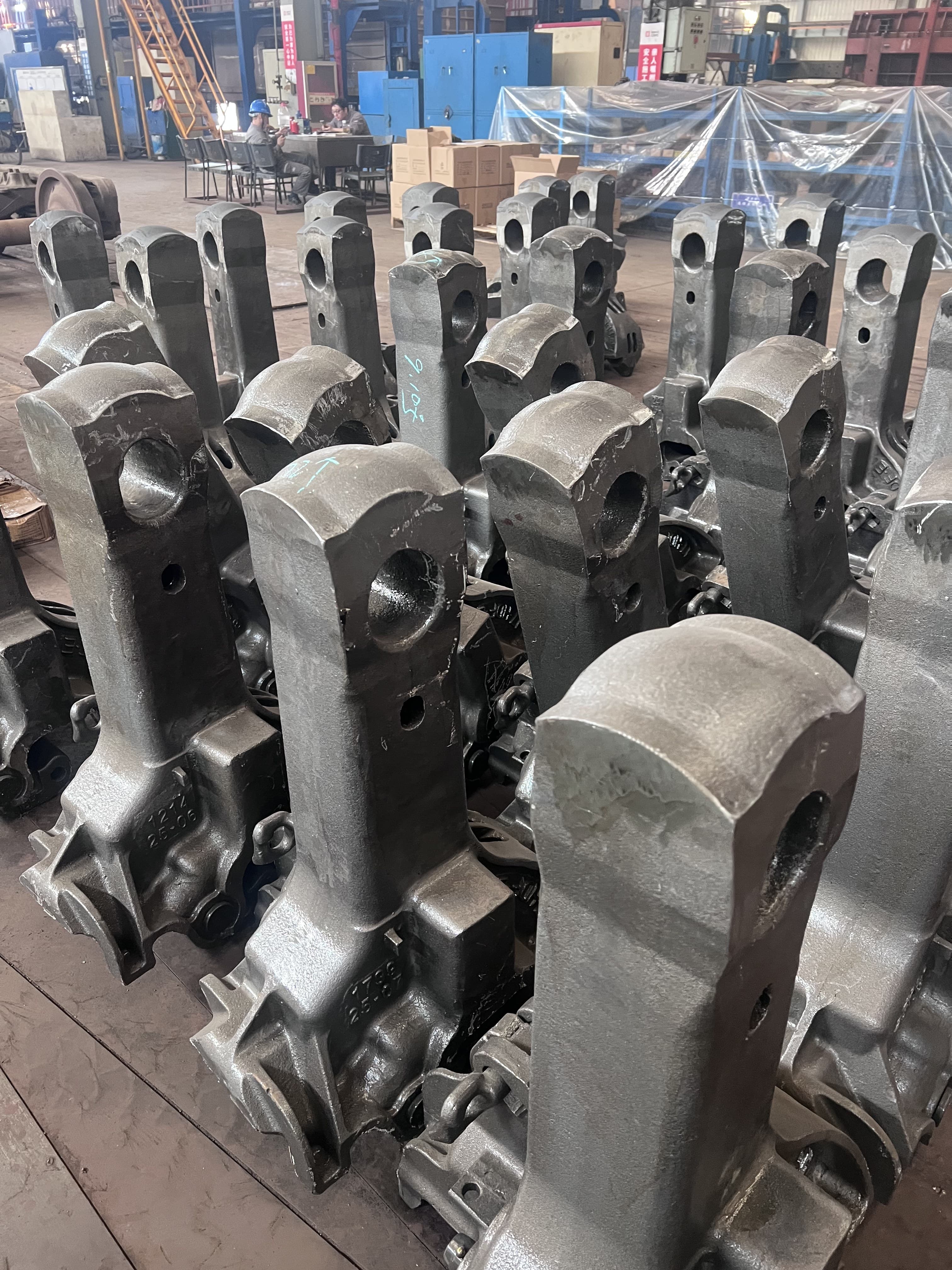 Heavy forged railway wagon components prepared inside a factory