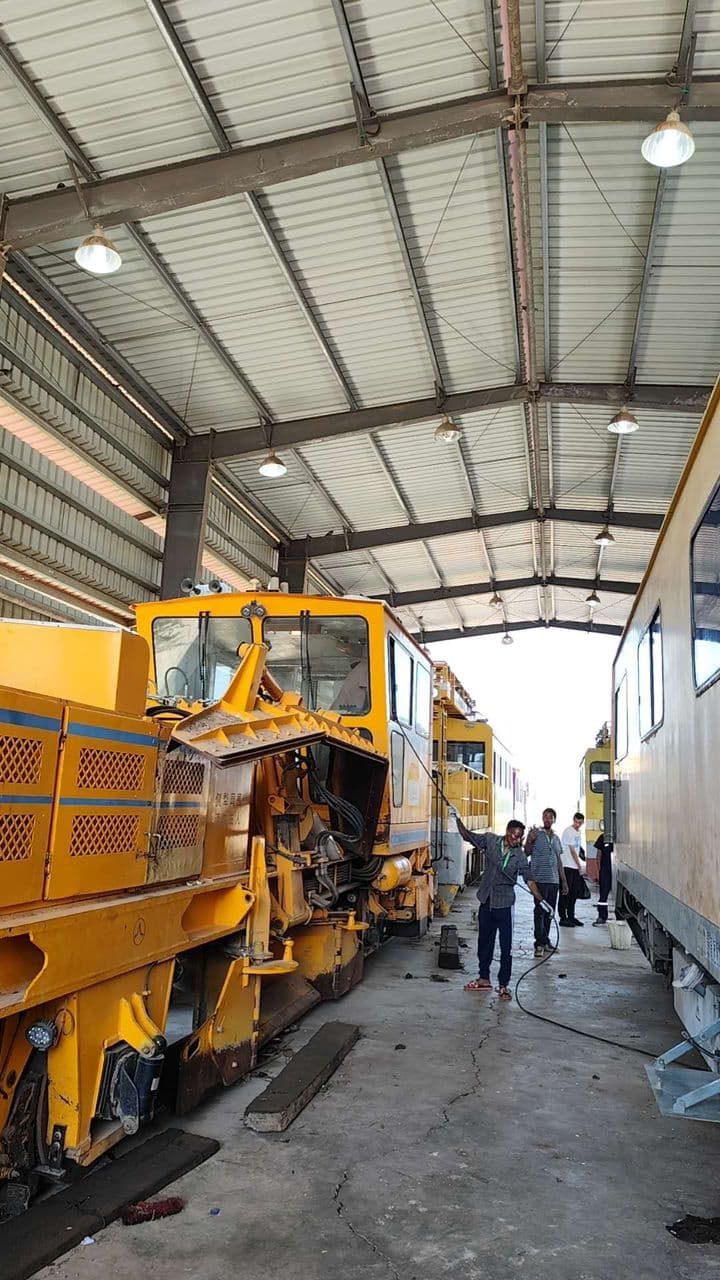 Railway maintenance vehicle inside a workshop