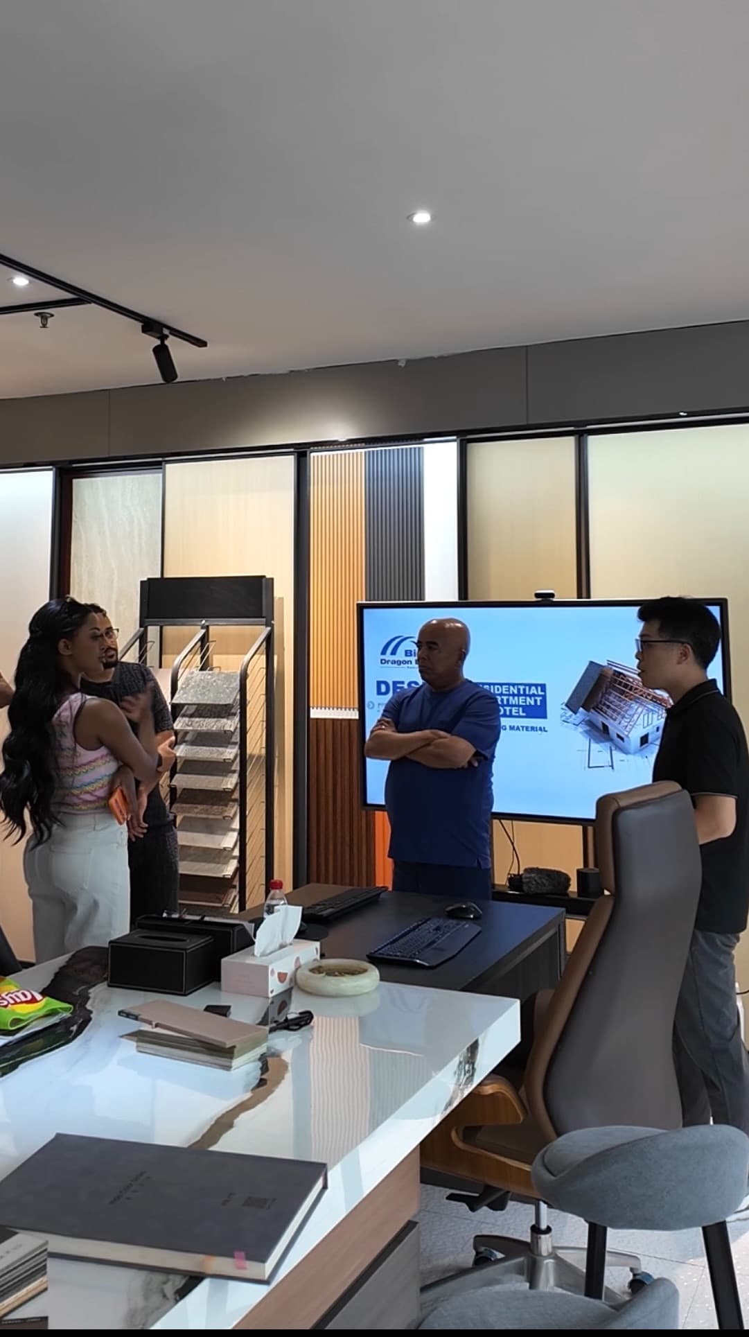Birara team reviewing building materials and residential project requirements with partners